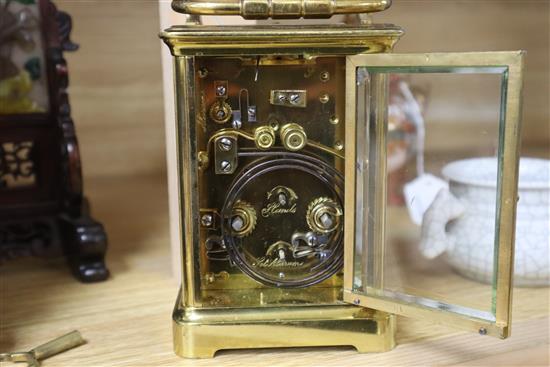 A brass cased hour repeating carriage clock height 13cm